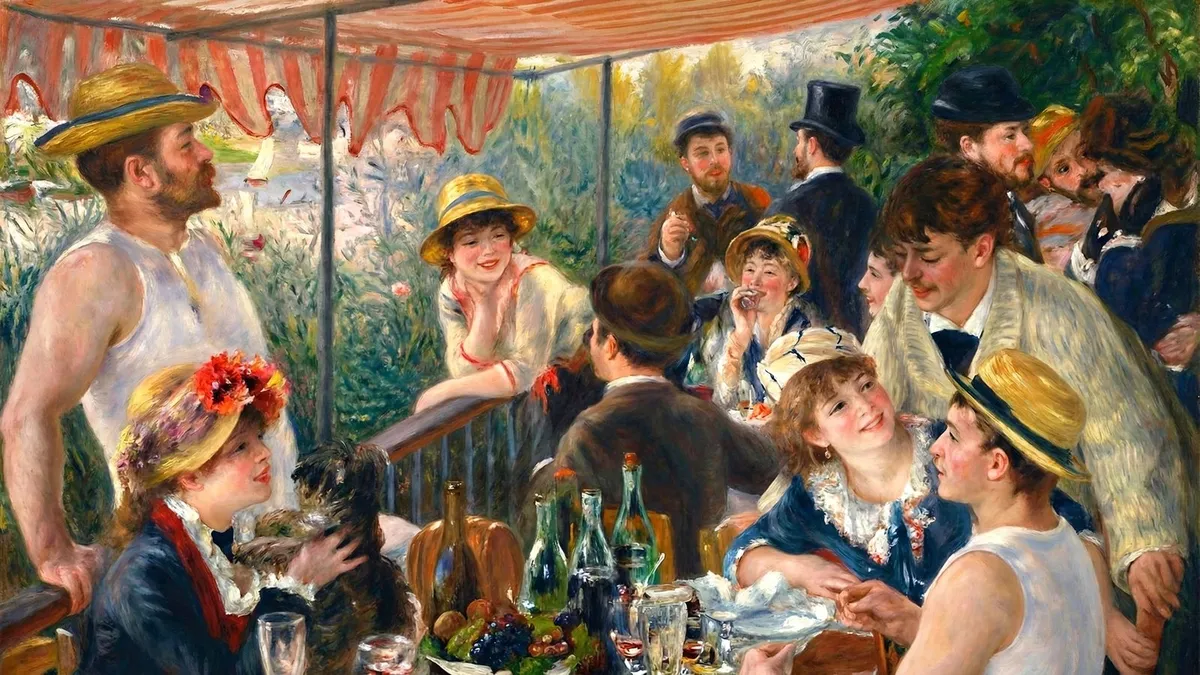 Men and women in straw hats gather around a table of fruit and wine on a shaded terrace above a river