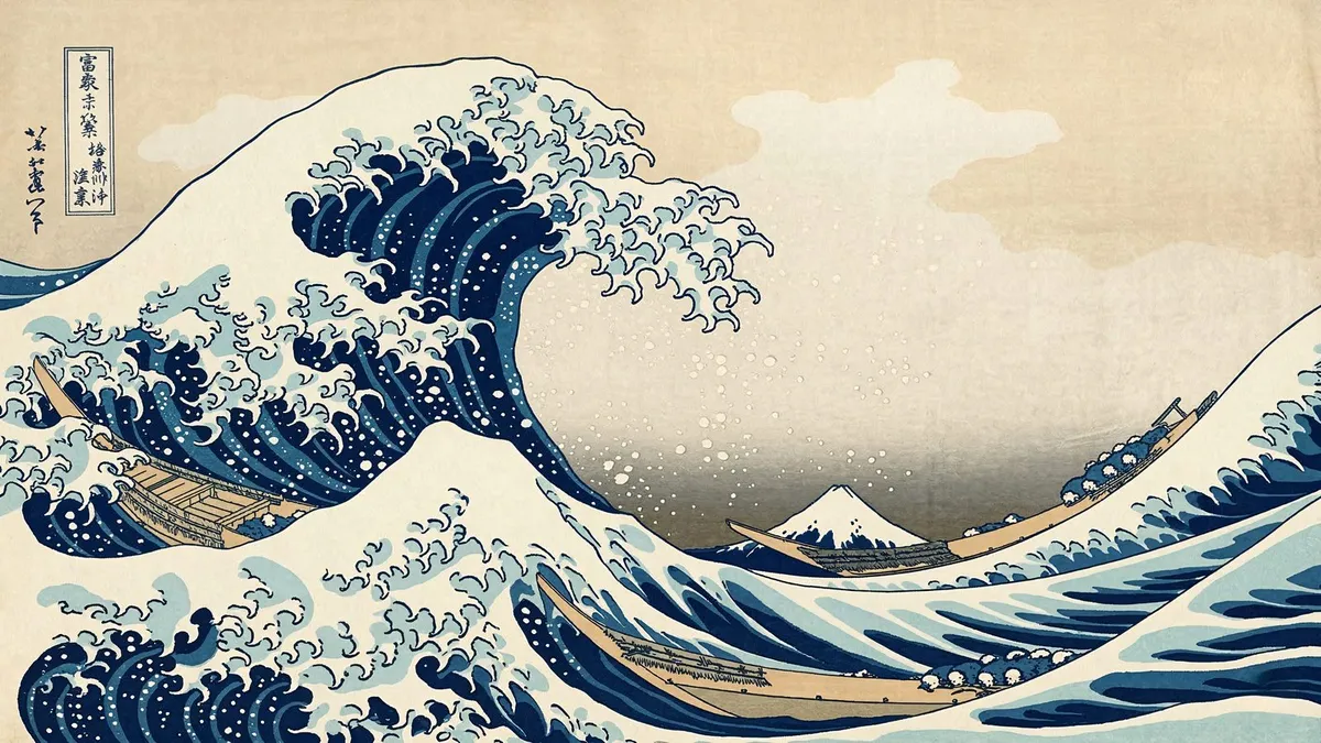 Giant blue wave with foamy claws curling over three boats, Mount Fuji small in the distance, cream sky