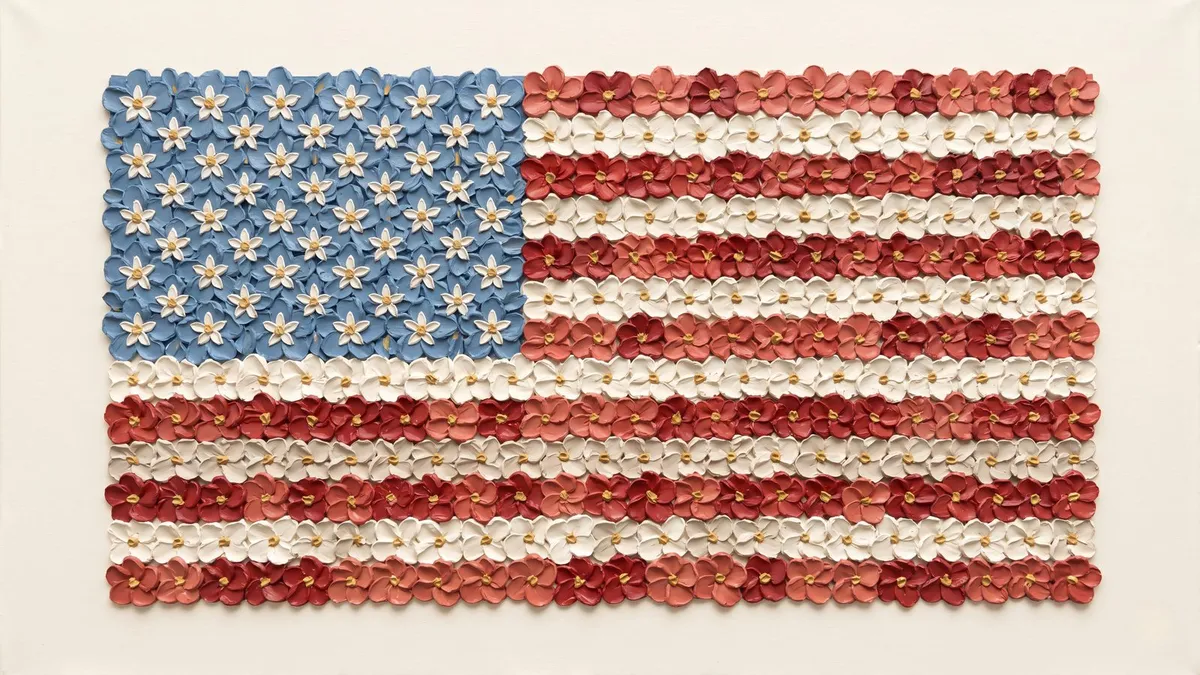 American flag made of raised blue, white and red blossoms with gold centers on a cream canvas