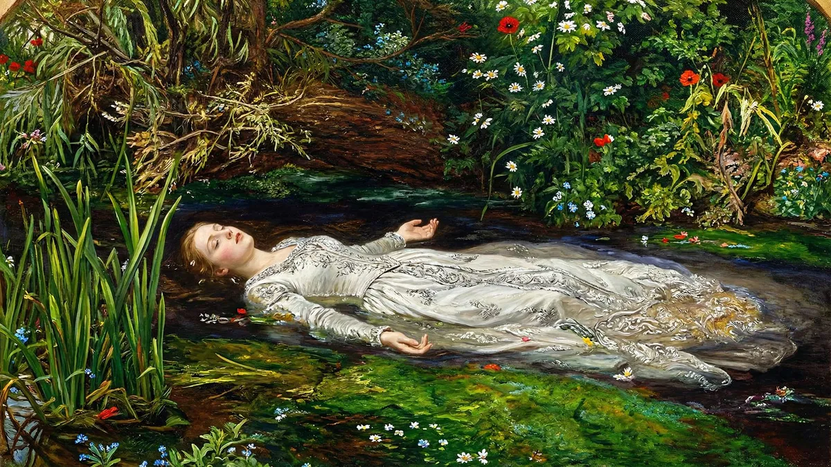 Woman in a silver-white embroidered gown floating on a dark stream among reeds, poppies and daisies